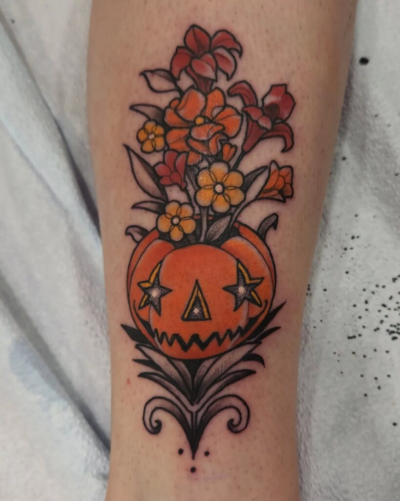 Jack O’ Lantern with Sunflowers Tattoo jack o lantern tattoo ideas tattoo