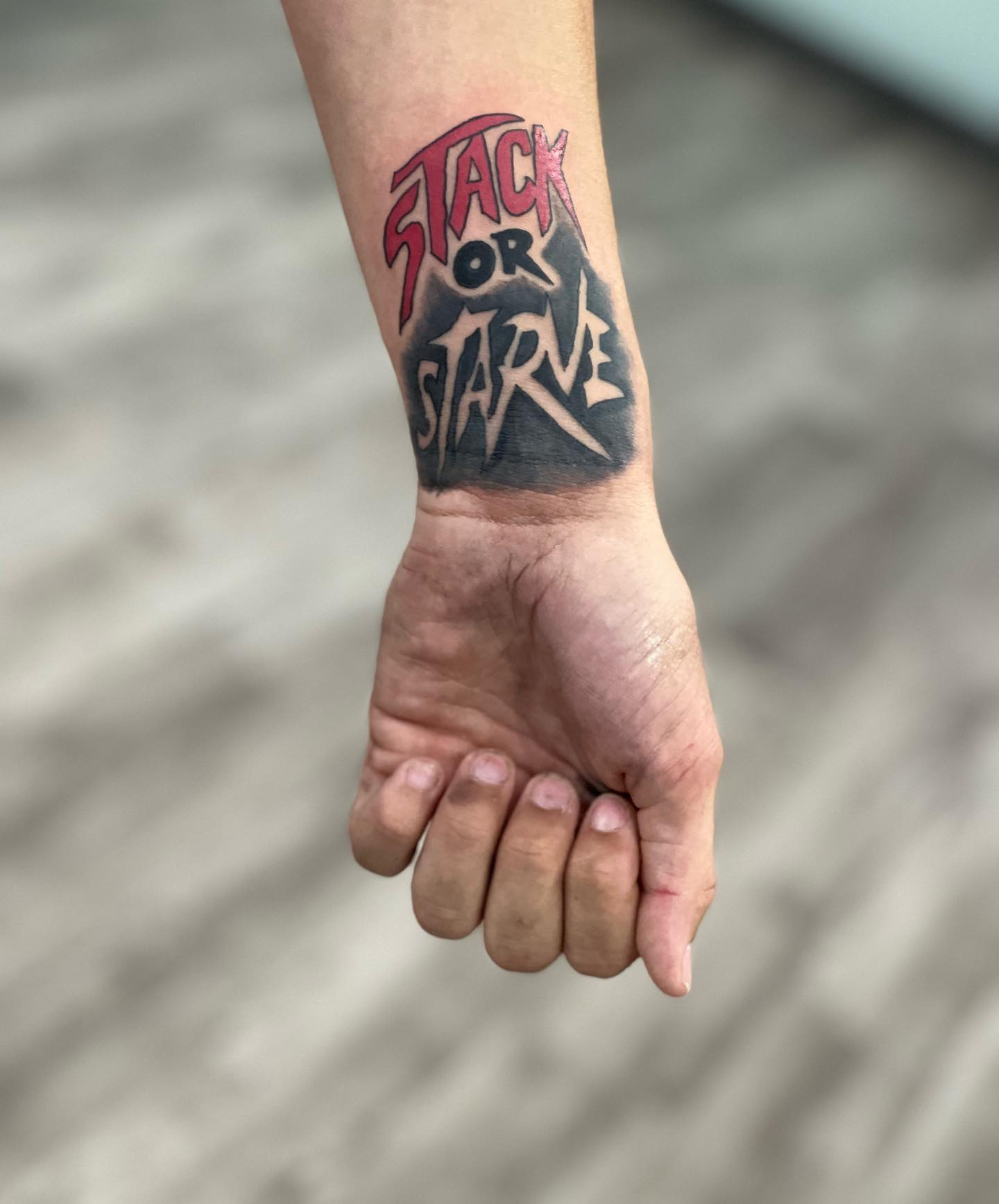 Jack of Spades Lettering Wrist Tattoo