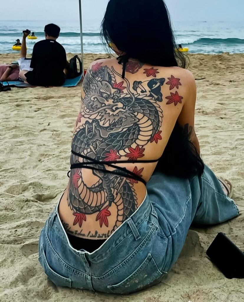 Floral Dragon Arm Tattoo