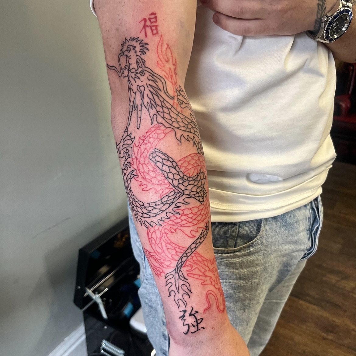 Dragon Outline Sleeve Tattoo