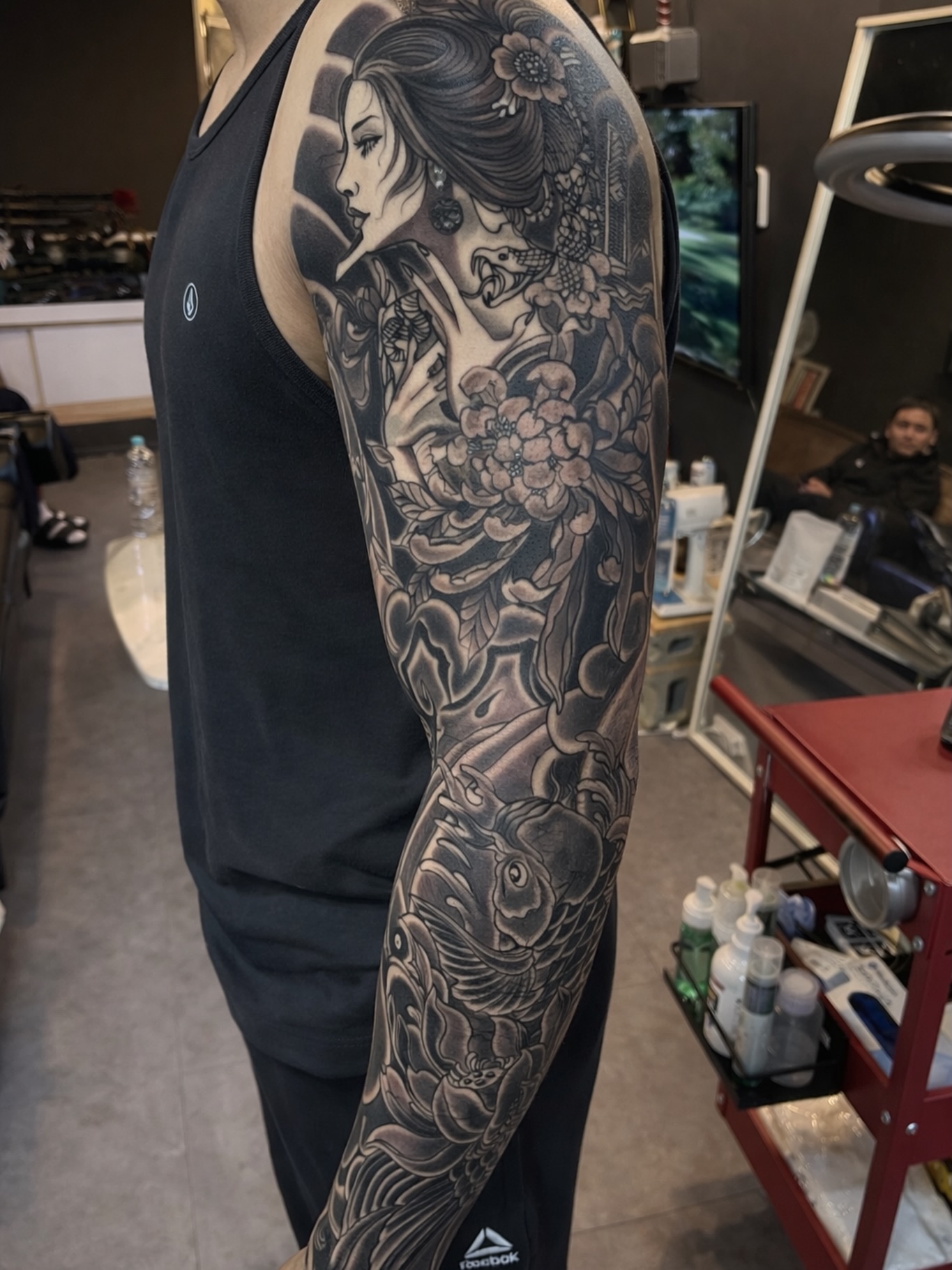 Geisha And Koi Sleeve Tattoo