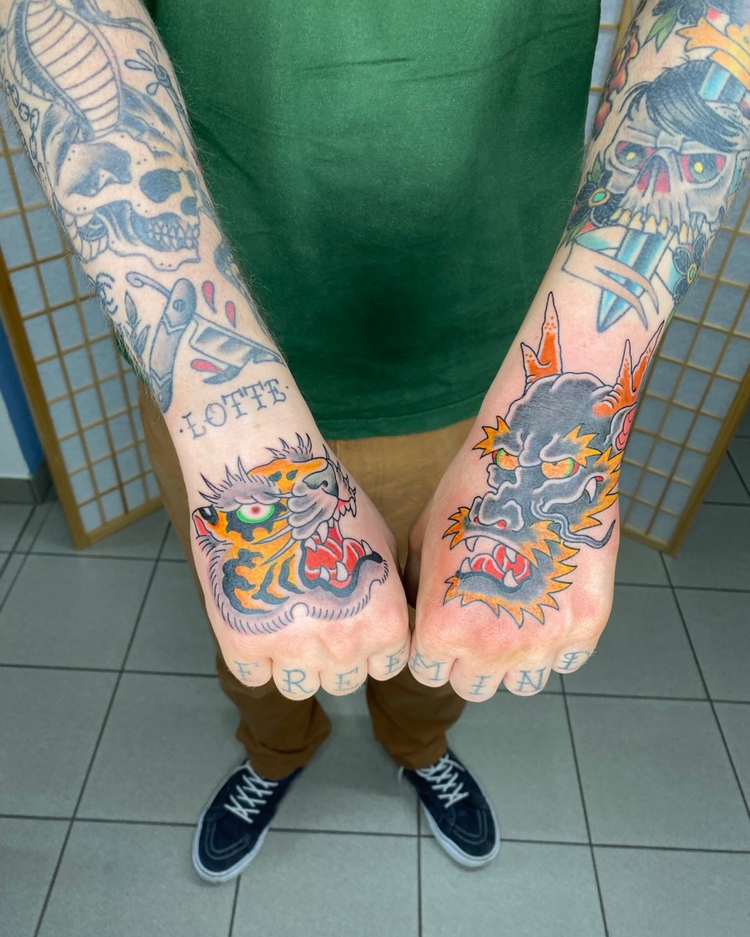 Tiger And Dragon Hand Tattoos