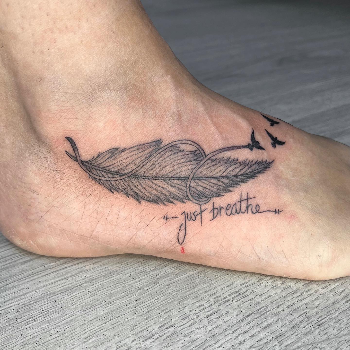Floral Feather Tattoo