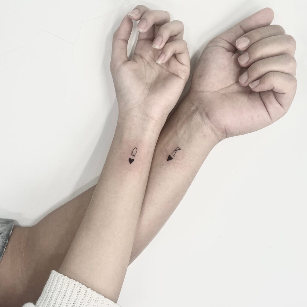 King and Queen of Hearts Couple Tattoos small couple tattoos tattoo