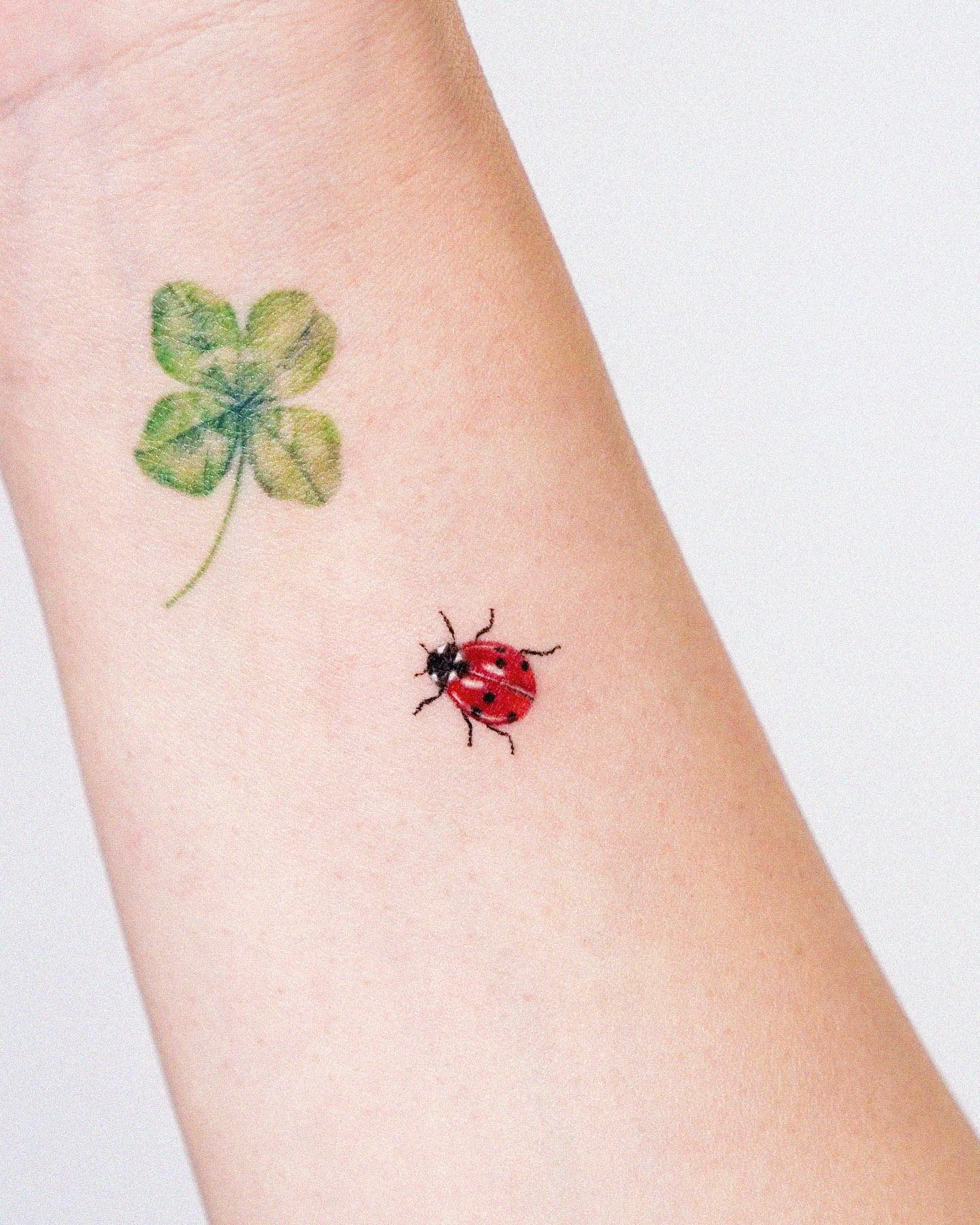 Ladybug And Wildflower Tattoo
