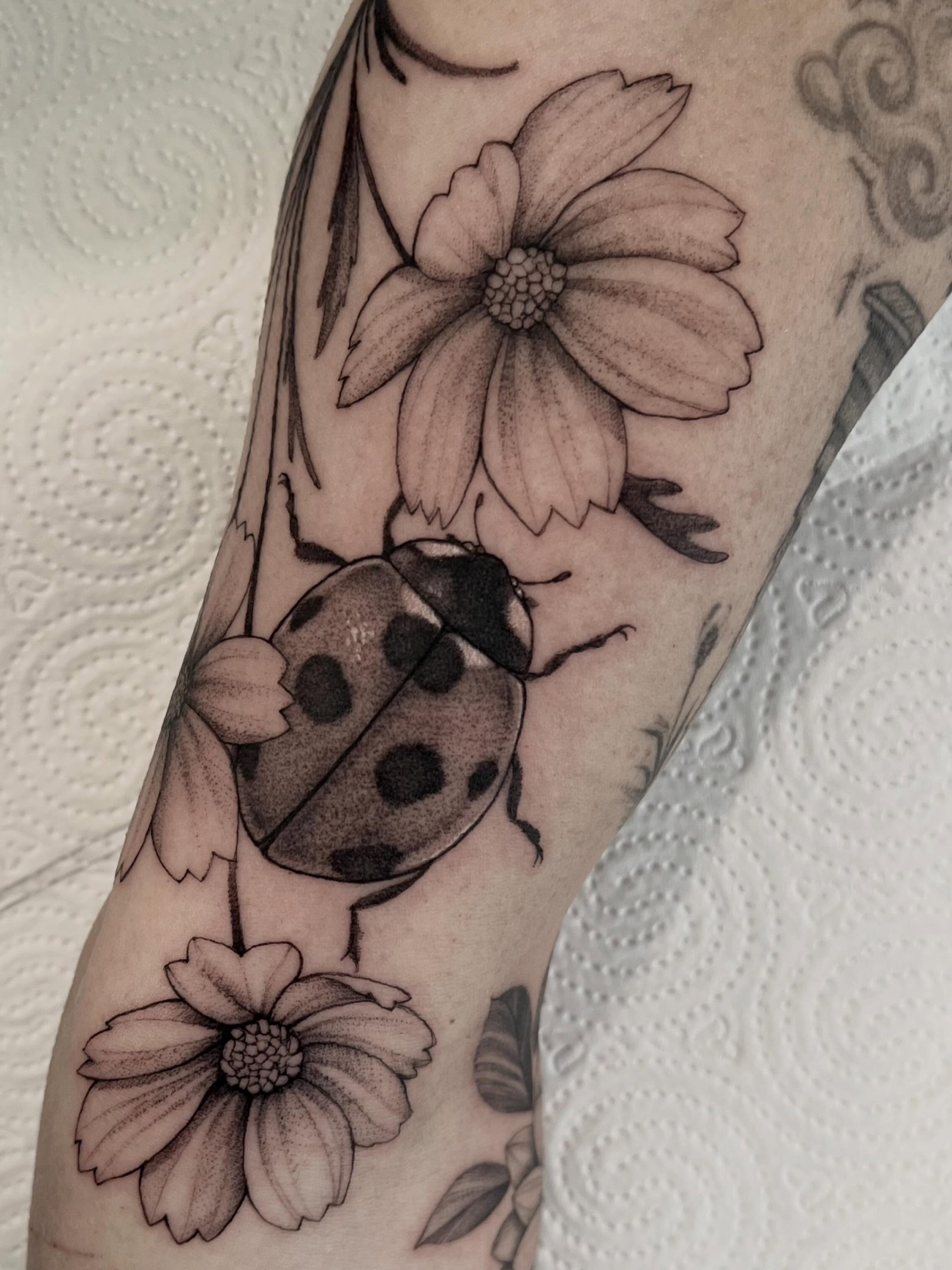 Tiny Realistic Shoulder Ladybug Tattoo
