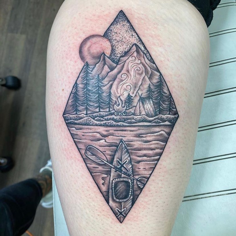 Lakeside Canoe and Campfire Solitude nature scene tattoo