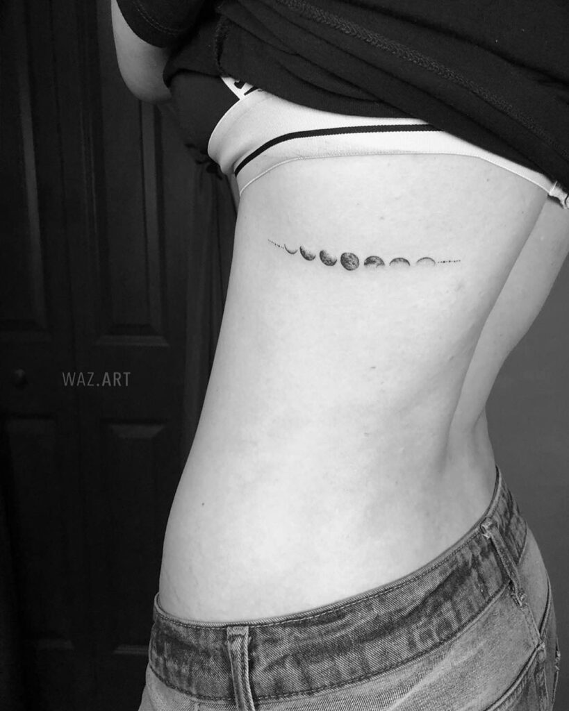 Moon phases tattoo on the side ribcage