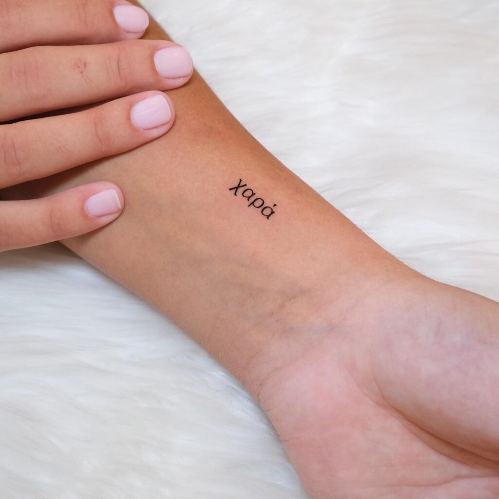 &ldquo;&Chi;&alpha;&rho;ά&rdquo; Minimalist Script Tattoo meaningful tattoos to check out tattoo