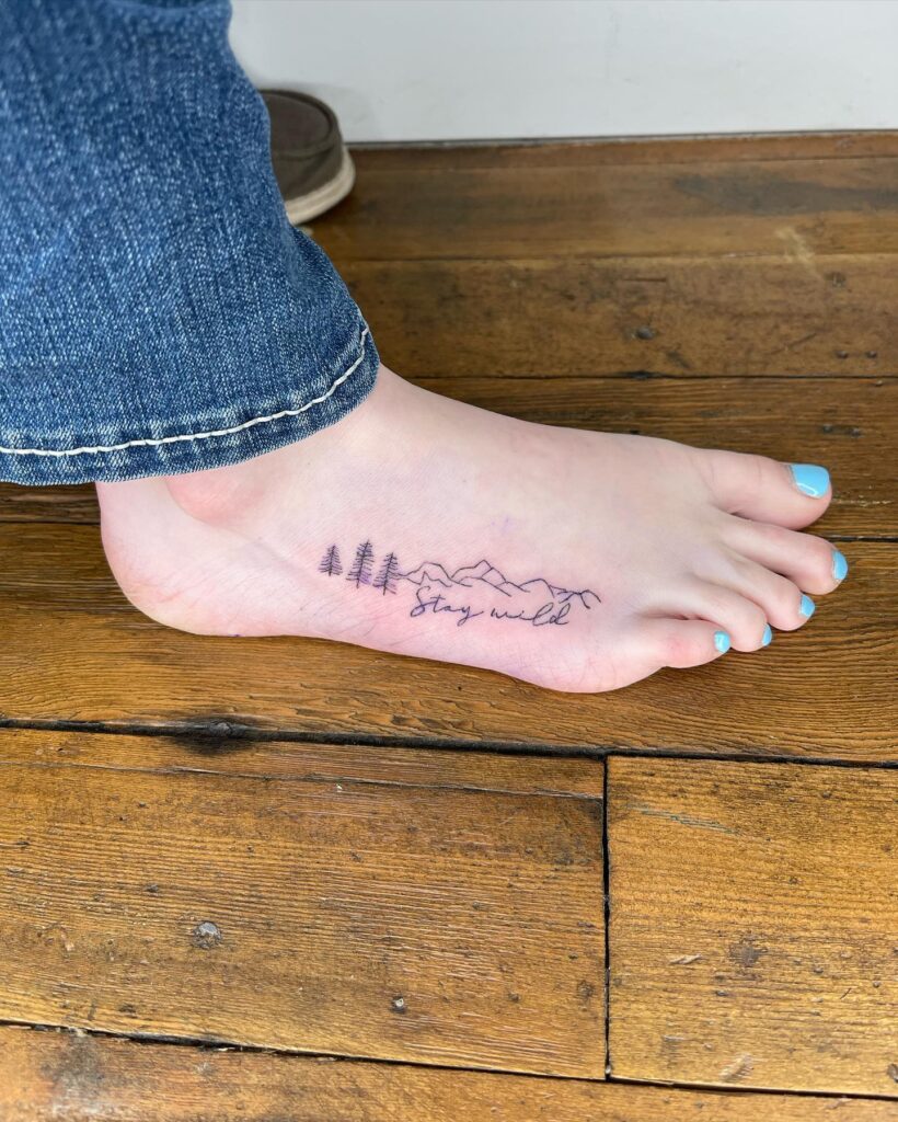 Vibrant Butterfly And Floral Foot Tattoo