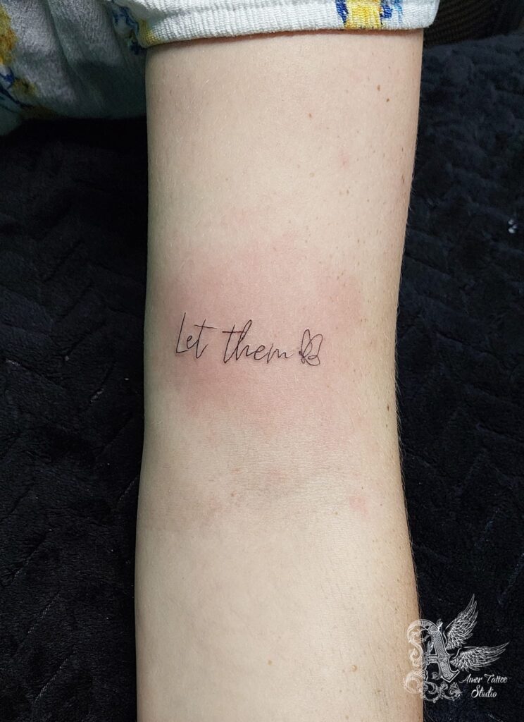 Let Them Tattoo in Elegant Script on Forearm let them tattoo ideas self expression tattoo