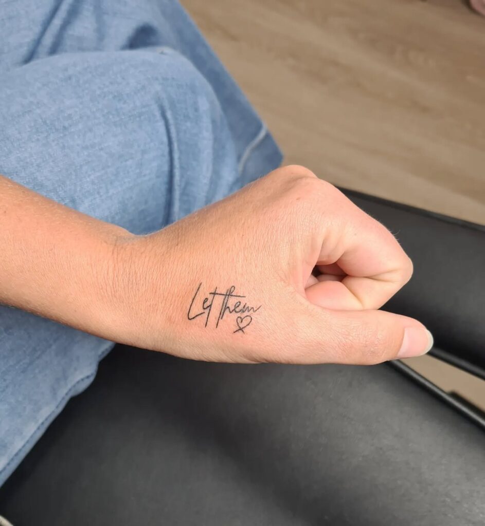 Let Them Wrist Tattoo with Stacked Open Heart Design let them tattoo ideas self expression tattoo