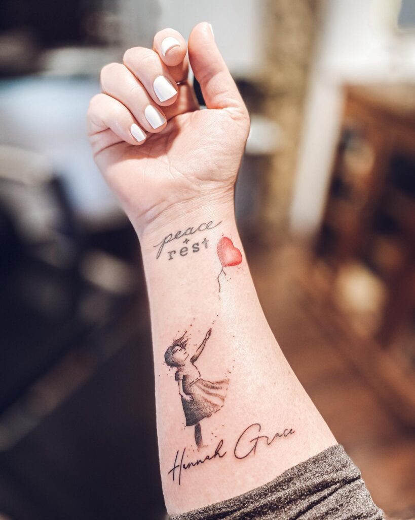 Minimalist Rainbow Baby Tattoo