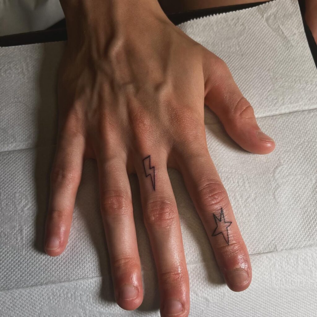 Dainty Starburst Hand Tattoos