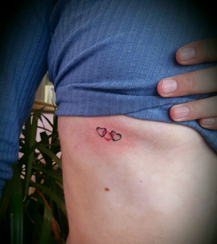 Minimalist Heart Finger Tattoo small heart tattoo ideas tattoo