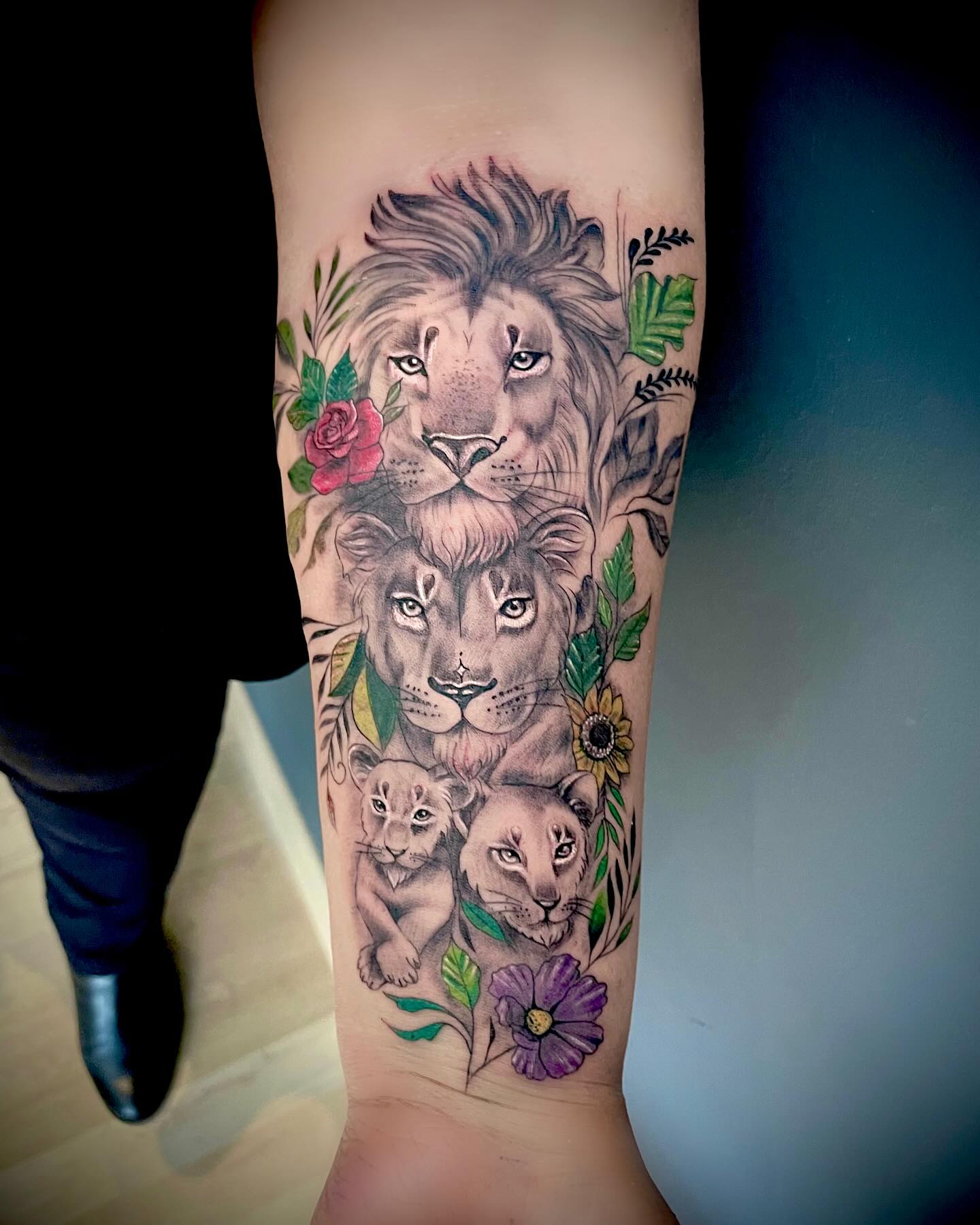 Lion Family With Floral Tribute Tattoo lion family tattoos tattoo