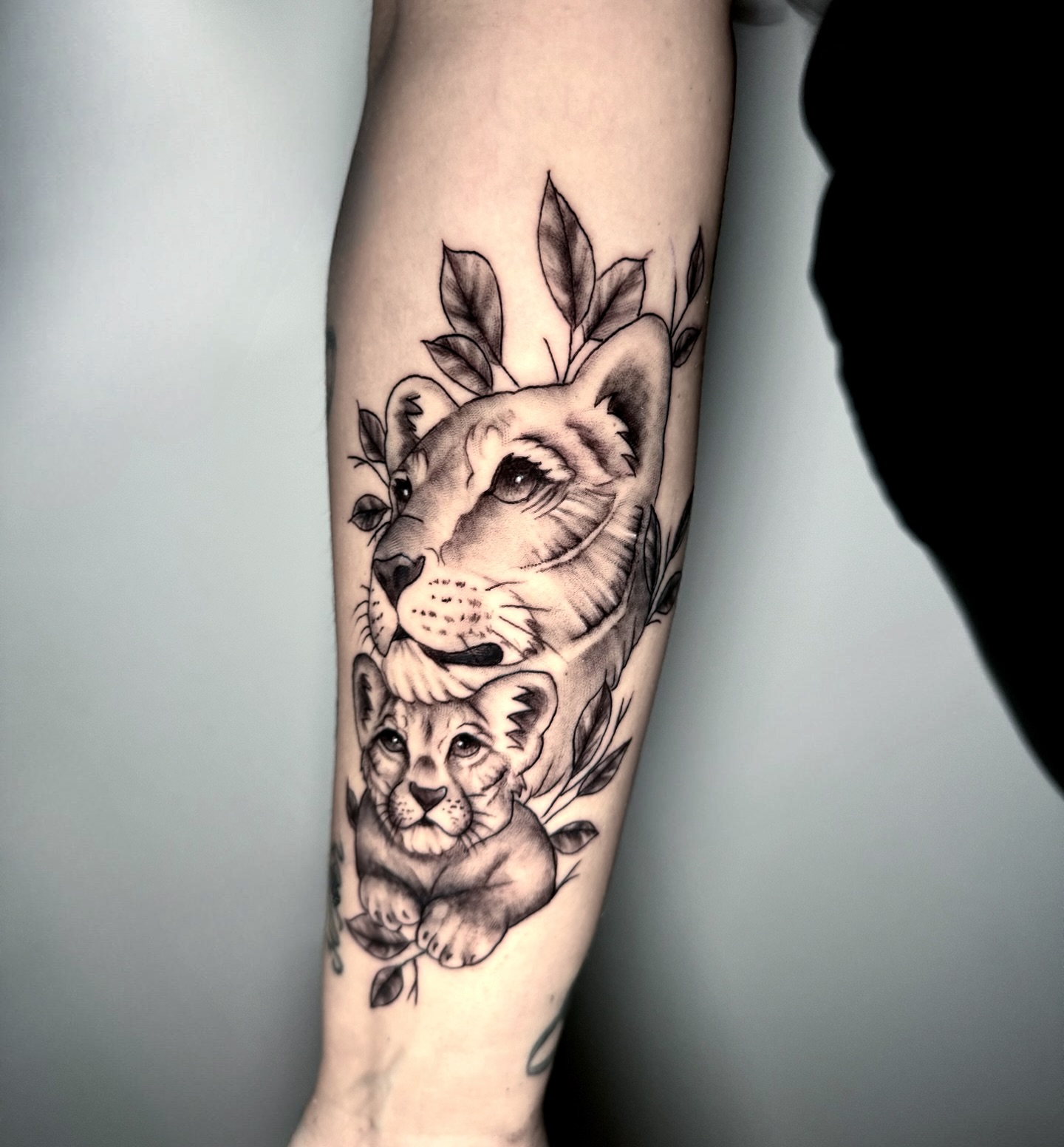 Lioness and Cub Botanical Family Tattoo lion family tattoos tattoo