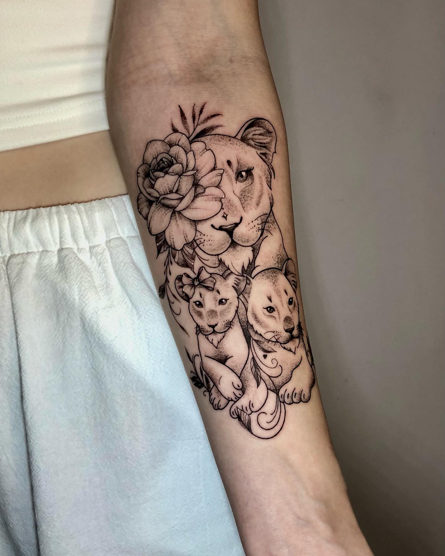 Lioness and Twin Cubs Floral Tattoo lion family tattoos tattoo