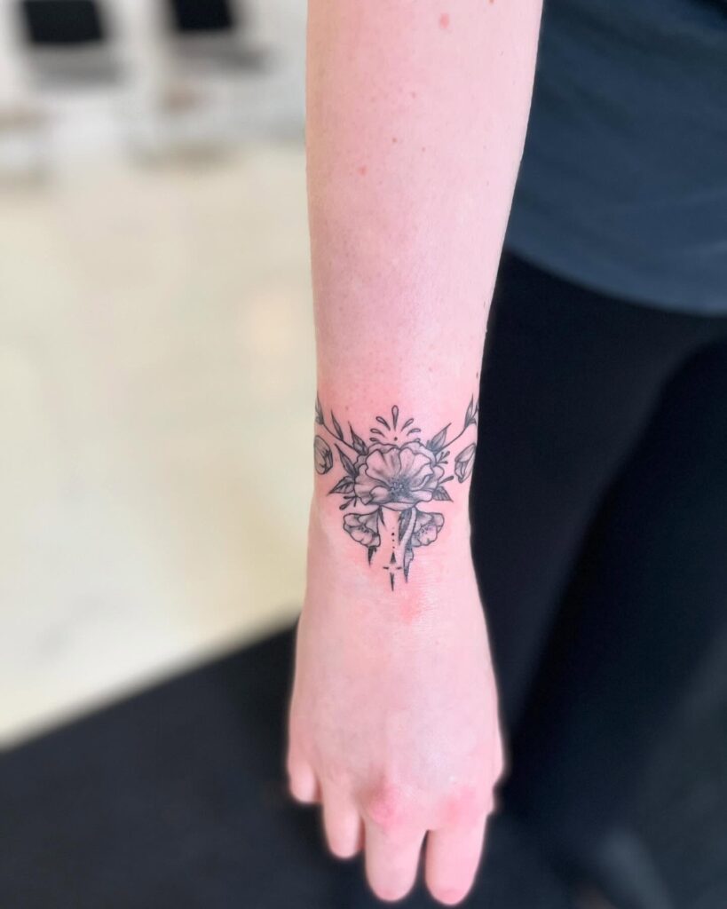 Little Floral Uterus Wrist Cuff Tattoo flower wrist tattoo ideas tattoo