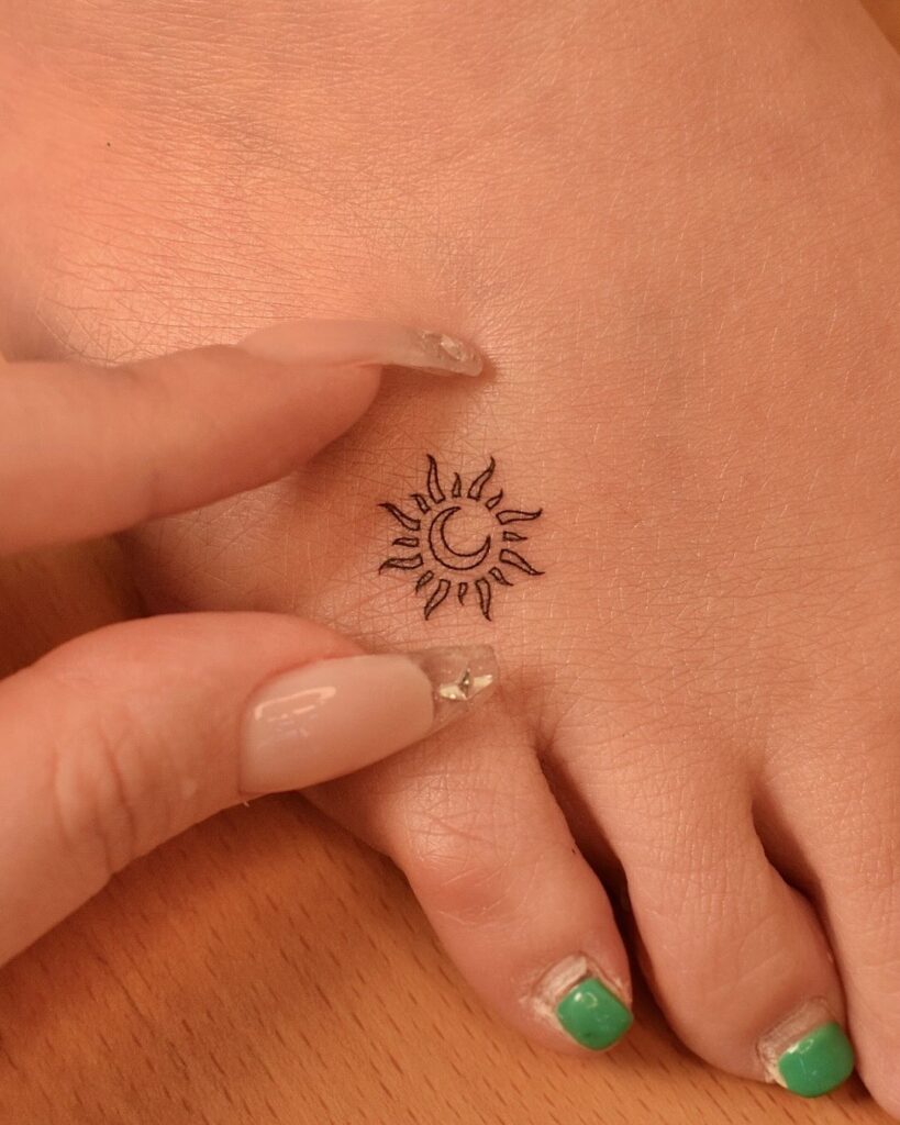 Little Sun with Moon Inside Tattoo little tattoos for women with meaning tattoo