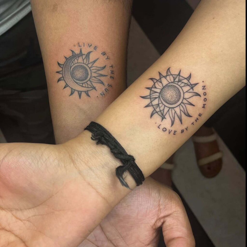Live by the sun love by the moon script tattoos