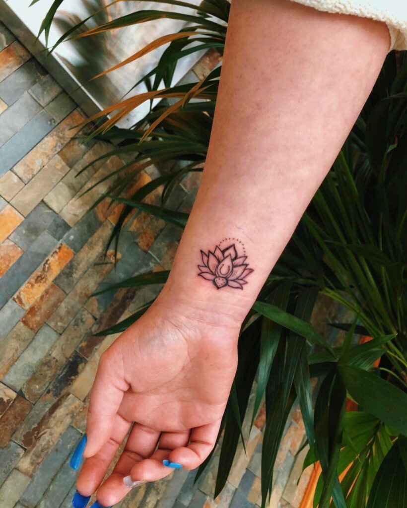 Lotus Flame Wrist Tattoo flower wrist tattoo ideas tattoo