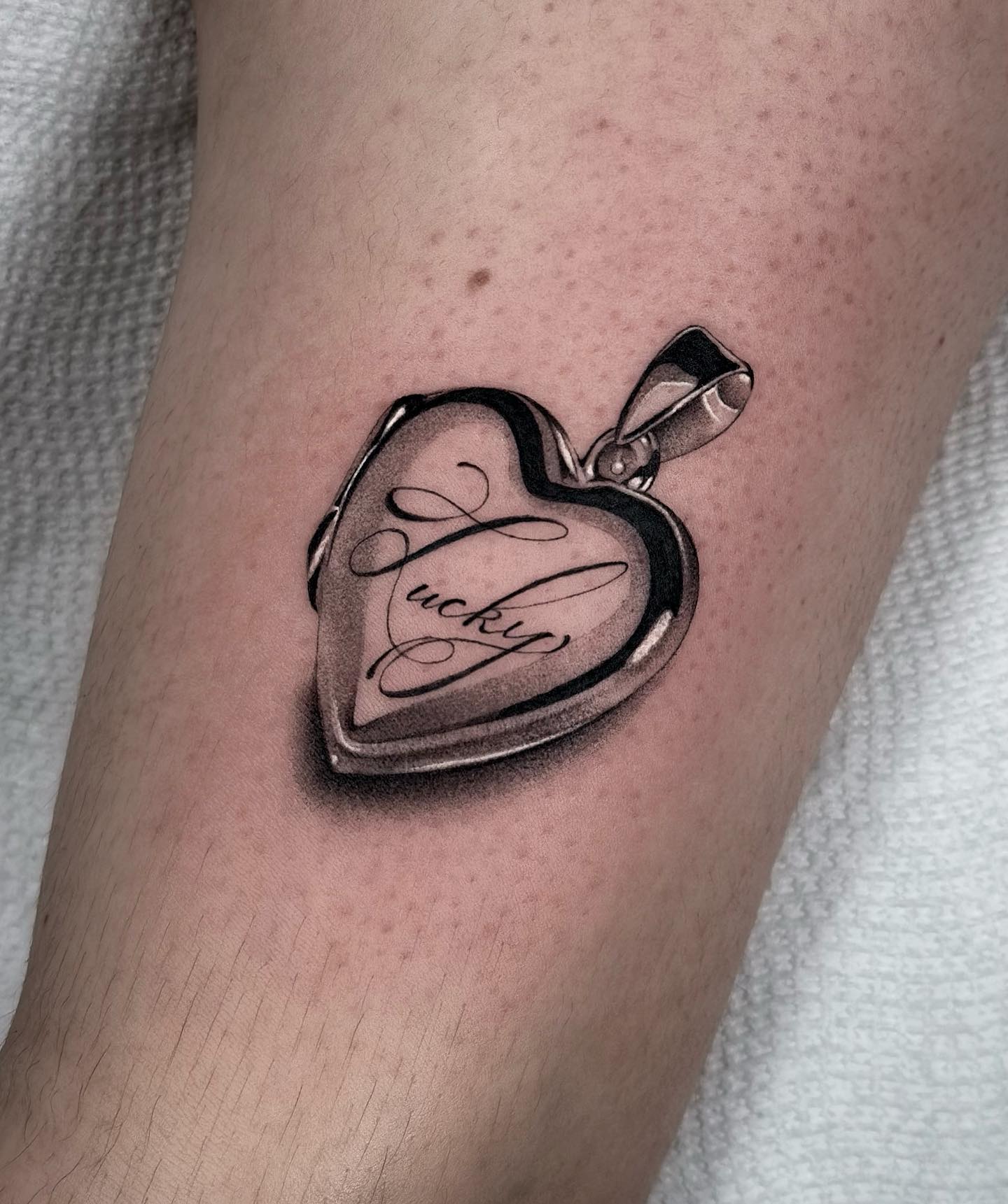Open Heart Locket Initial Tattoo
