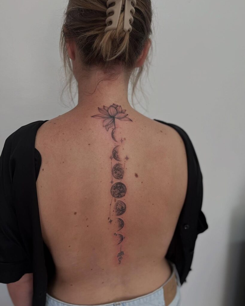 Blooming Floral And Butterfly Spine Tattoo