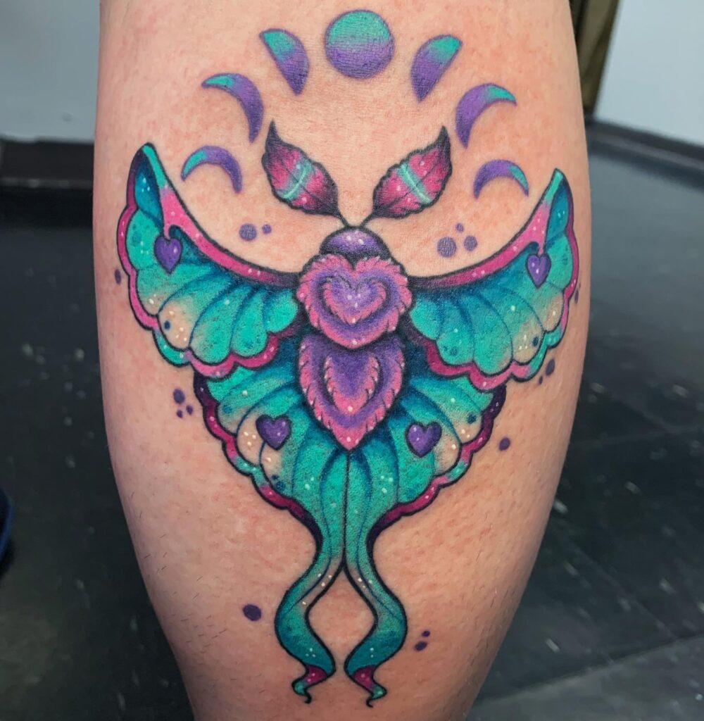 Lunar moth with moon phases tattoo