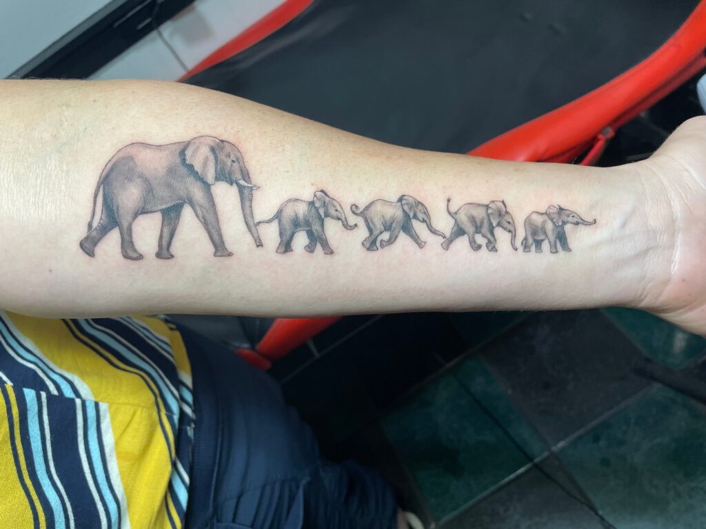 March of the Elephant Family Tattoo elephant family tattoo ideas tattoo