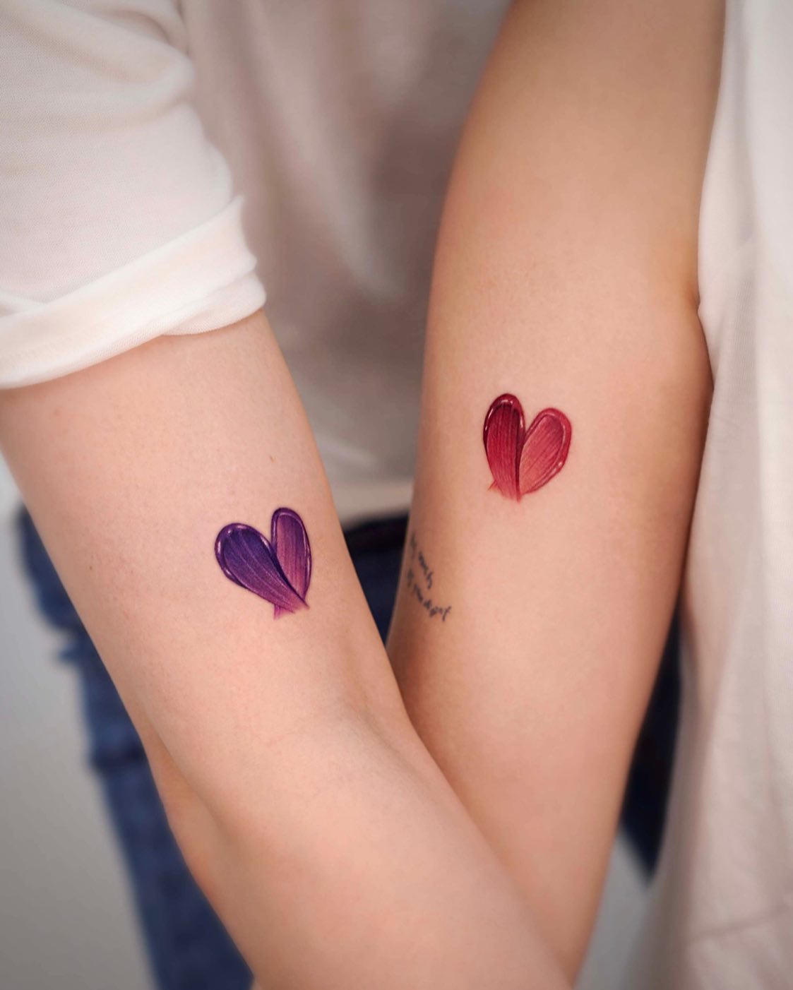 Matching Brushstroke Heart Tattoos for Mom and Daughter unique mom and daughter tattoos tattoo