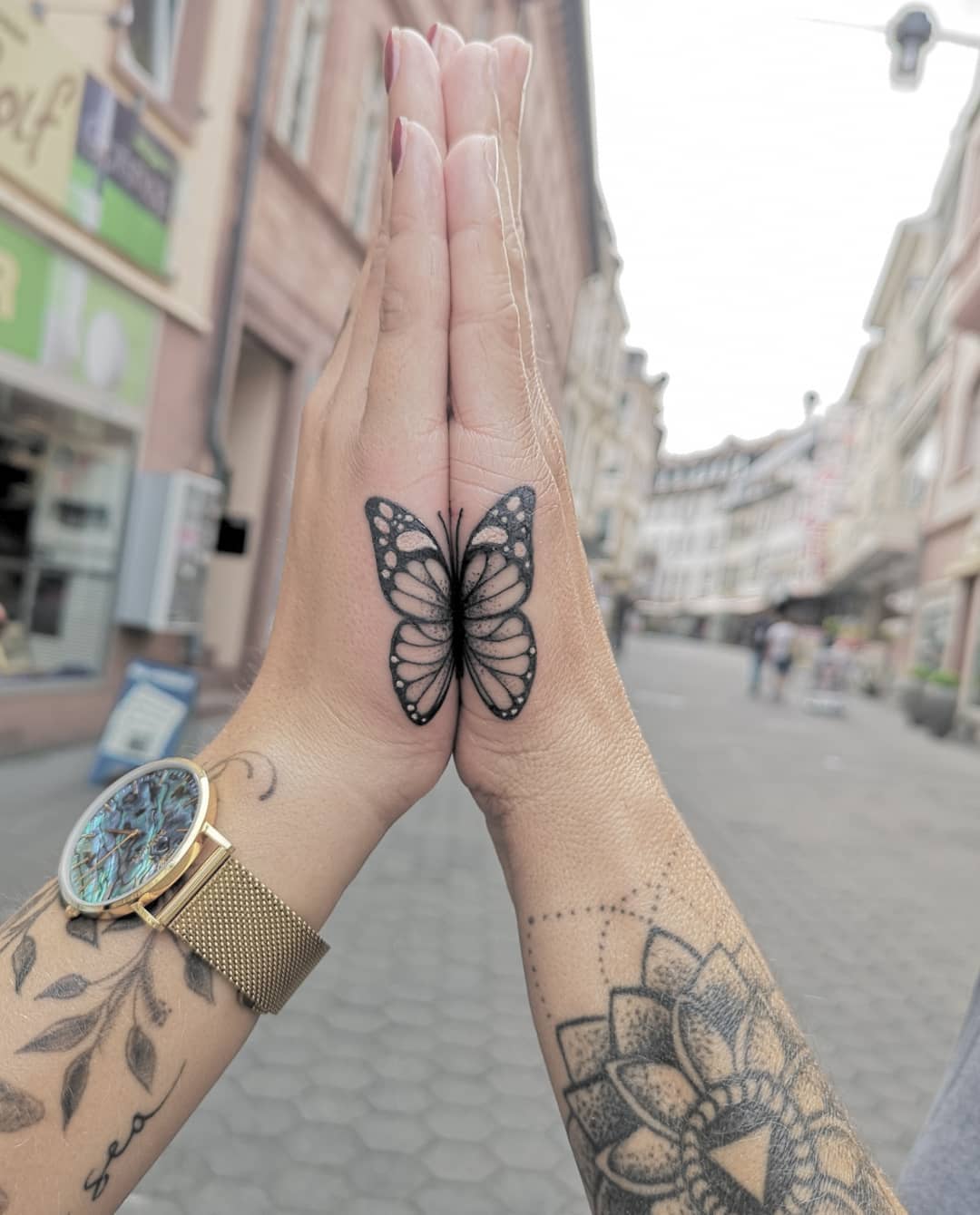 Matching Butterfly Hand Tattoos for Mother and Daughter unique mom and daughter tattoos tattoo