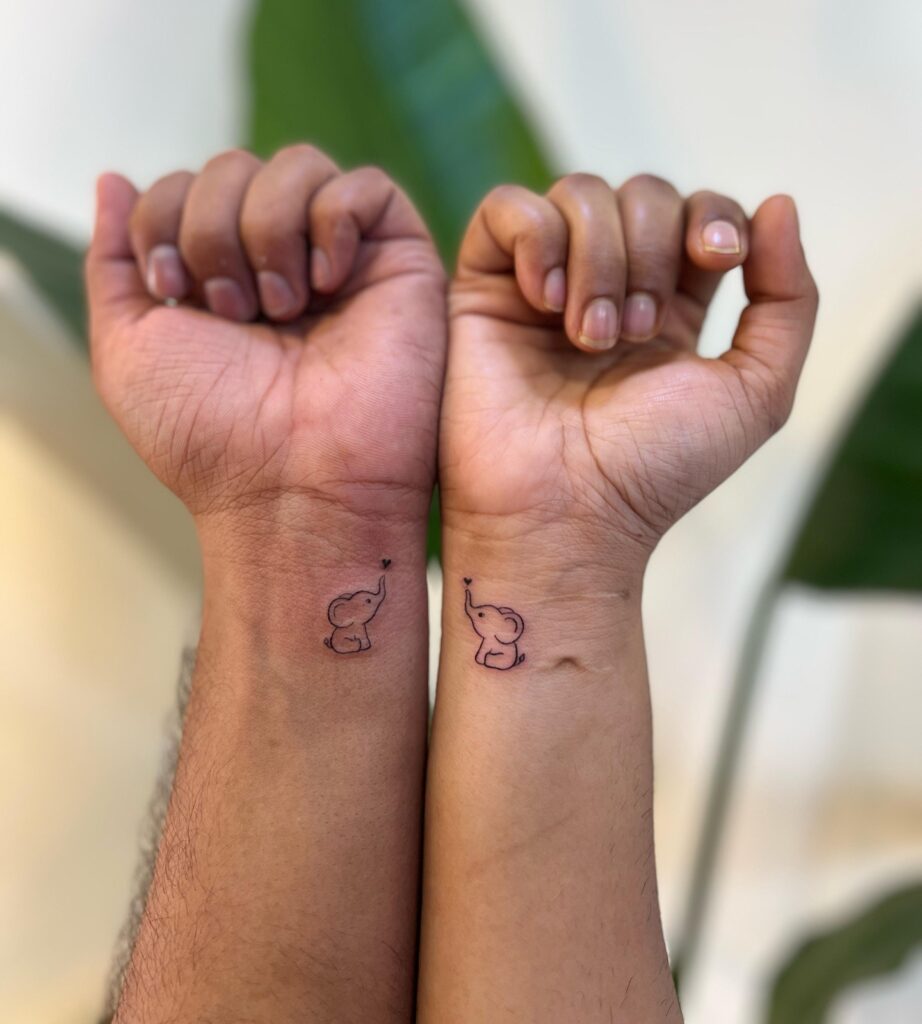Matching Elephant Tattoos small couple tattoos tattoo