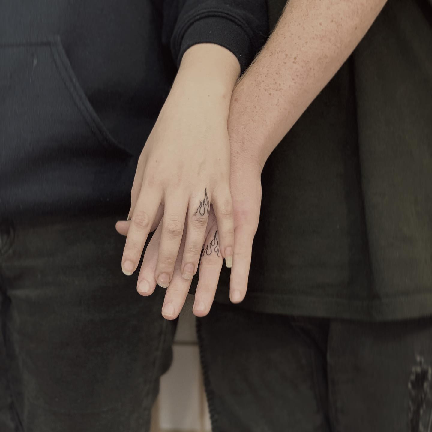 Matching Finger Flame Tattoo