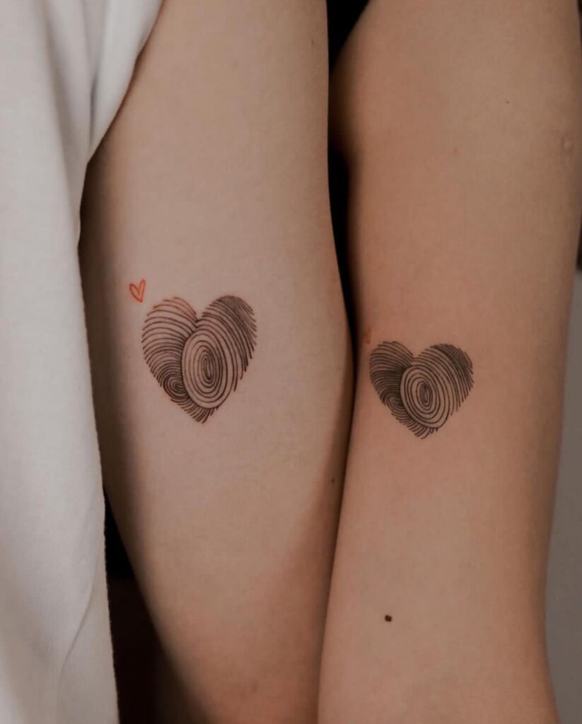 Matching Heart Fingerprint Tattoos