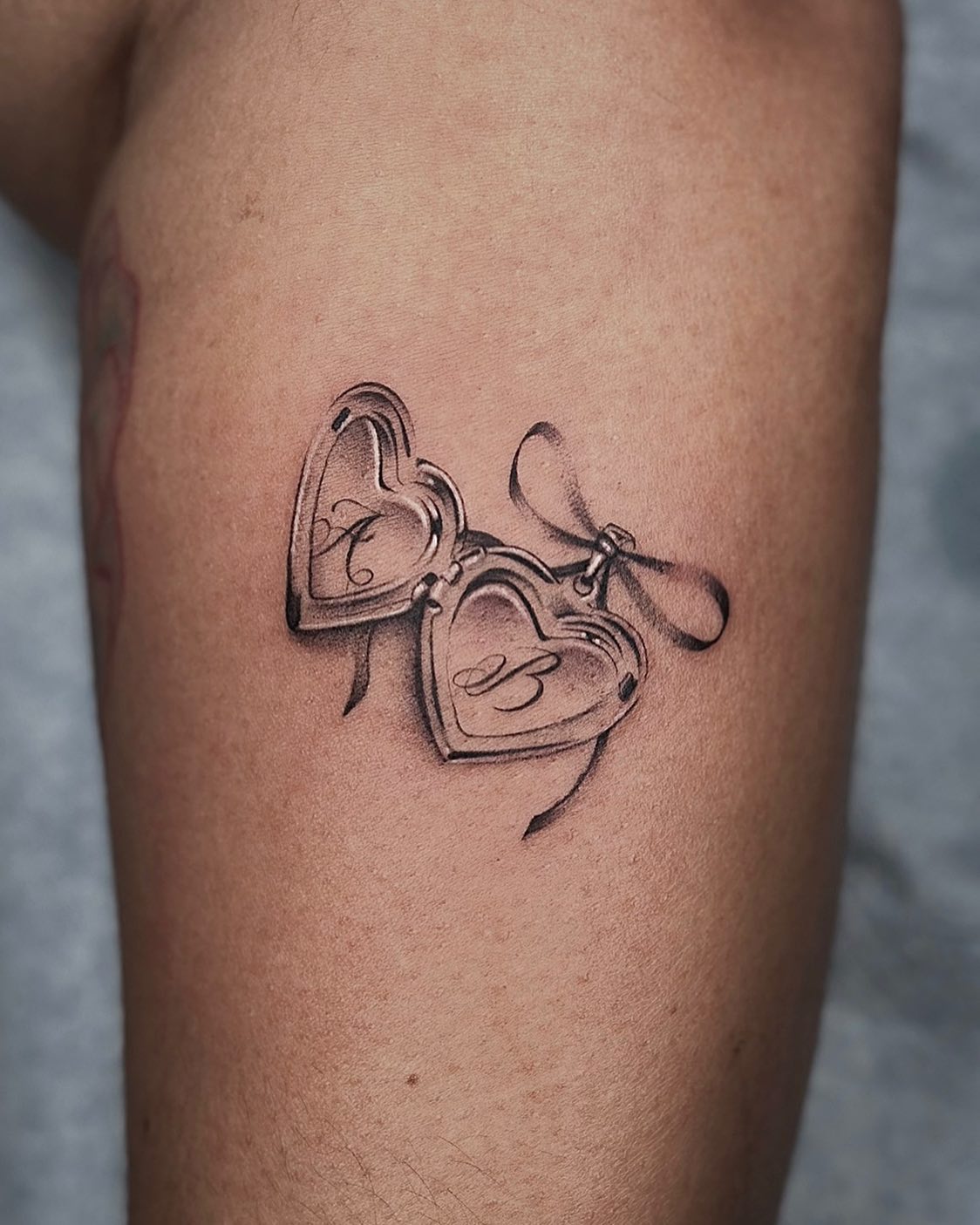 Floral Double Locket Initials Tattoo