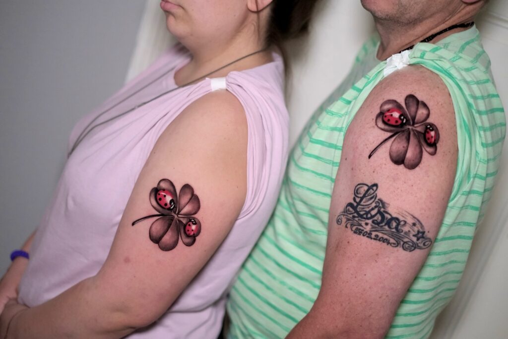 Matching Ladybug and Four-Leaf Clover Tattoos father daughter tattoos tattoo
