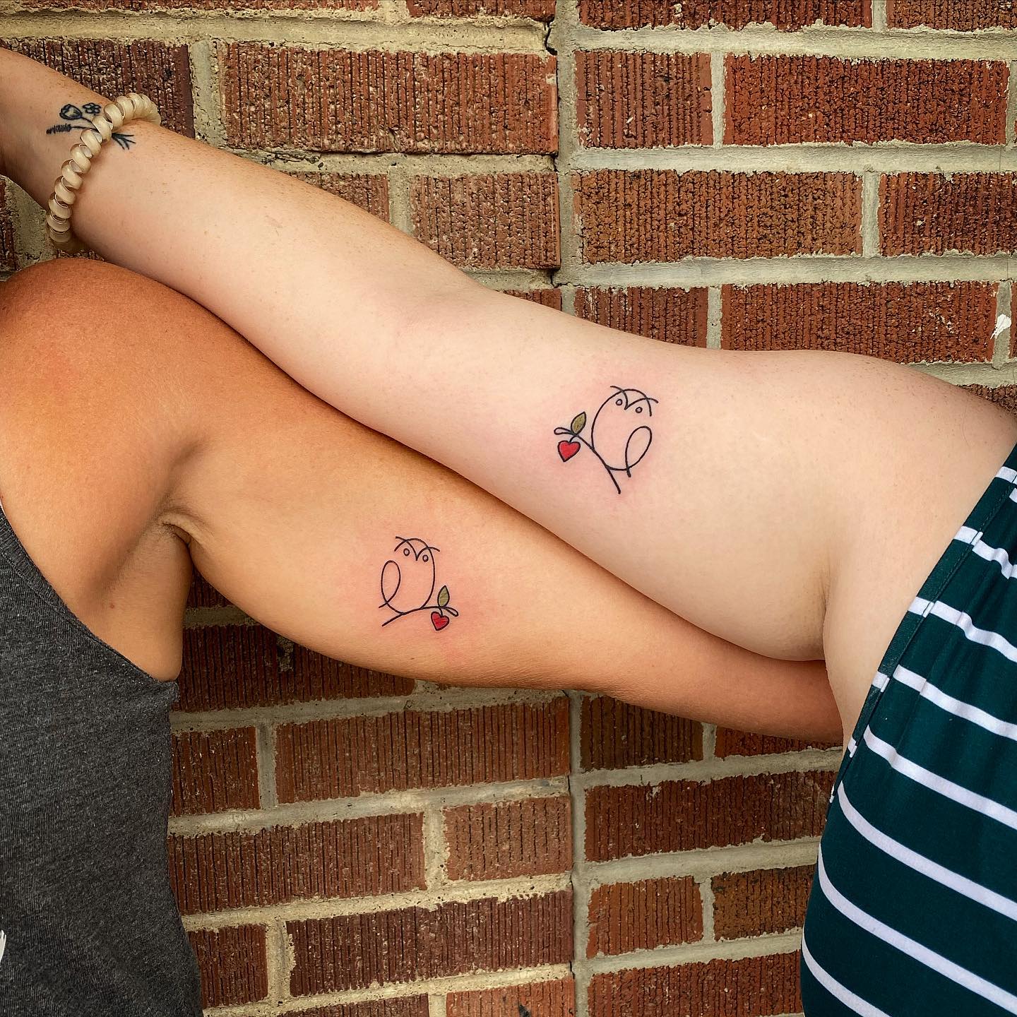 Matching Minimalist Owl Tattoos with Heart for Mother and Daughter unique mom and daughter tattoos tattoo