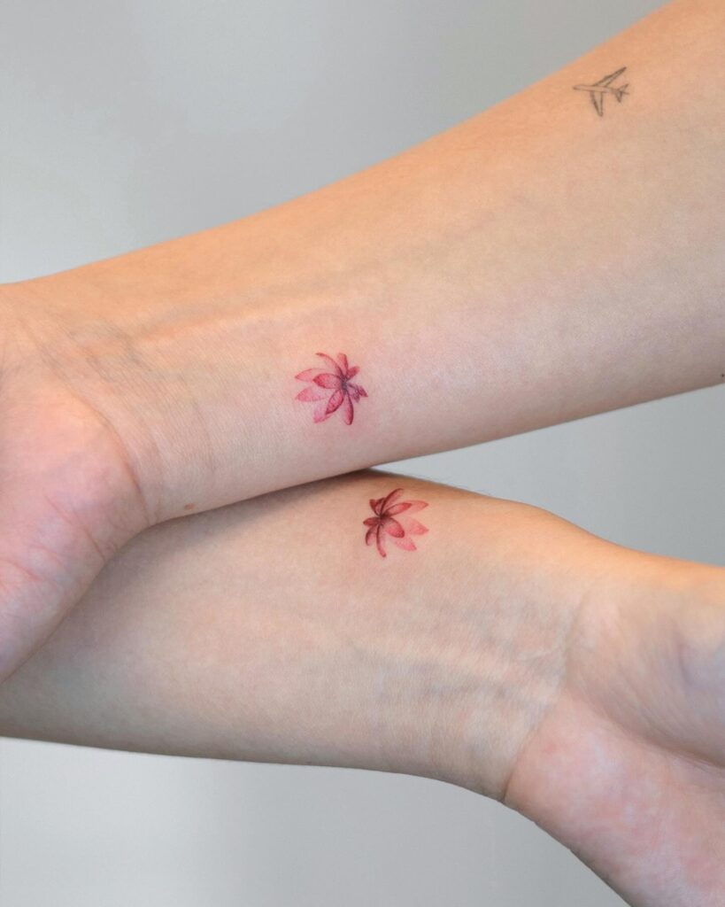 Matching Pink Lotus Tattoos