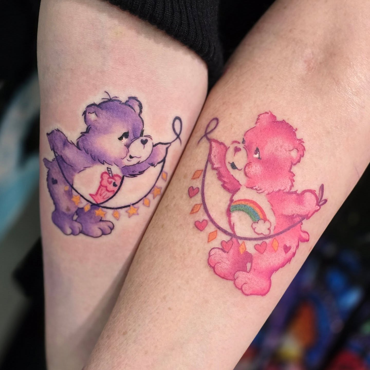 Matching Purple and Pink Care Bear Tattoos for Mother and Daughter unique mom and daughter tattoos tattoo