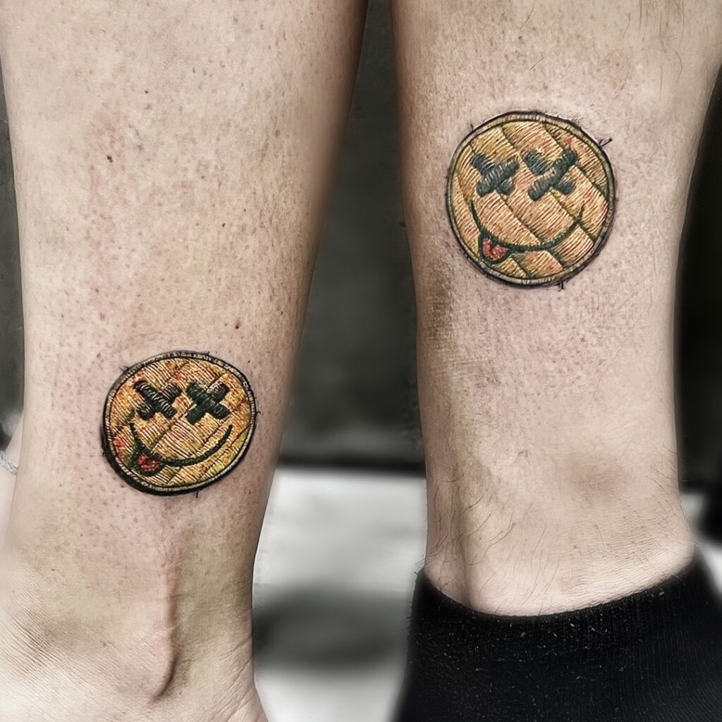 Matching Stitched Smiley Face Tattoos