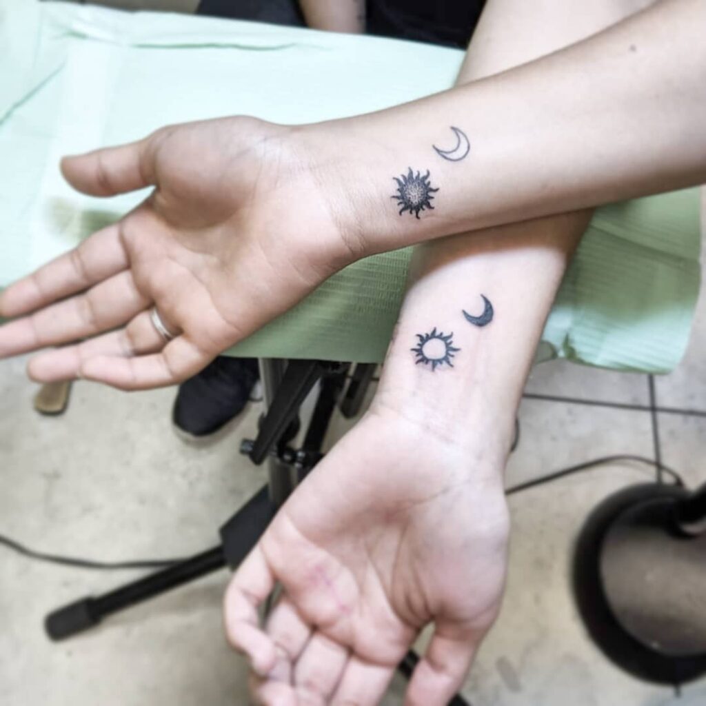 Matching Sun and Moon Couple Tattoos symbolic sun and moon tattoo ideas tattoo