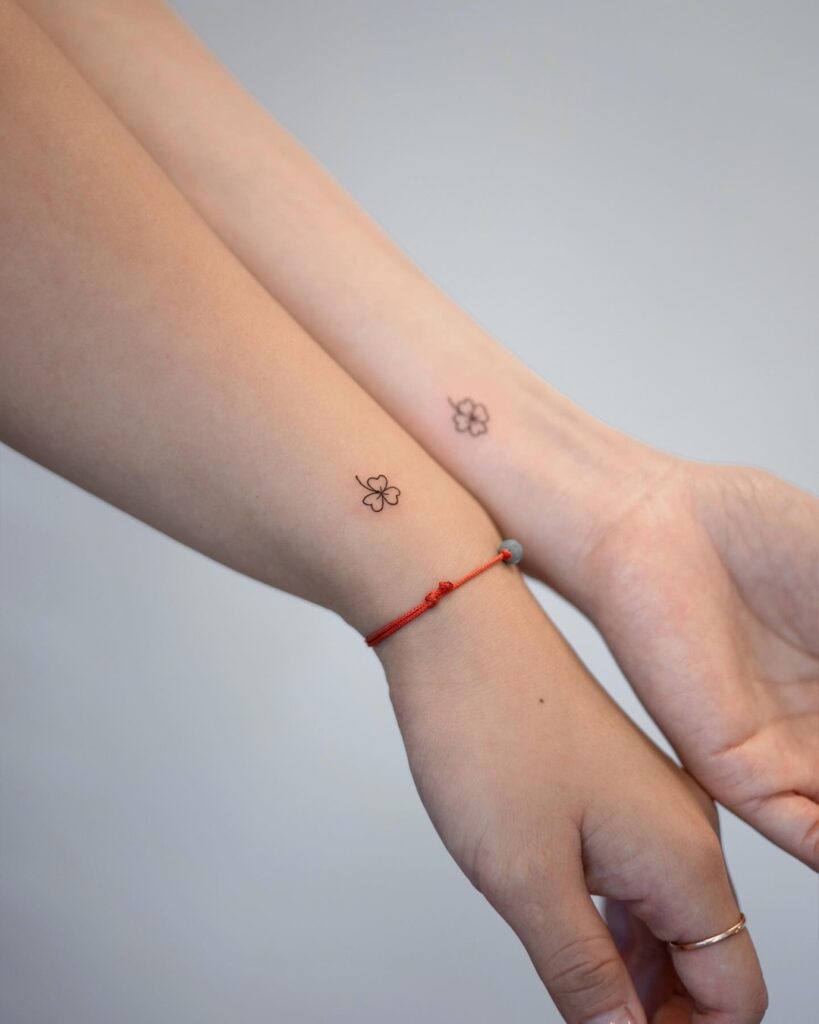 Matching Tiny Clover Tattoos meaningful tiny tattoos tattoo