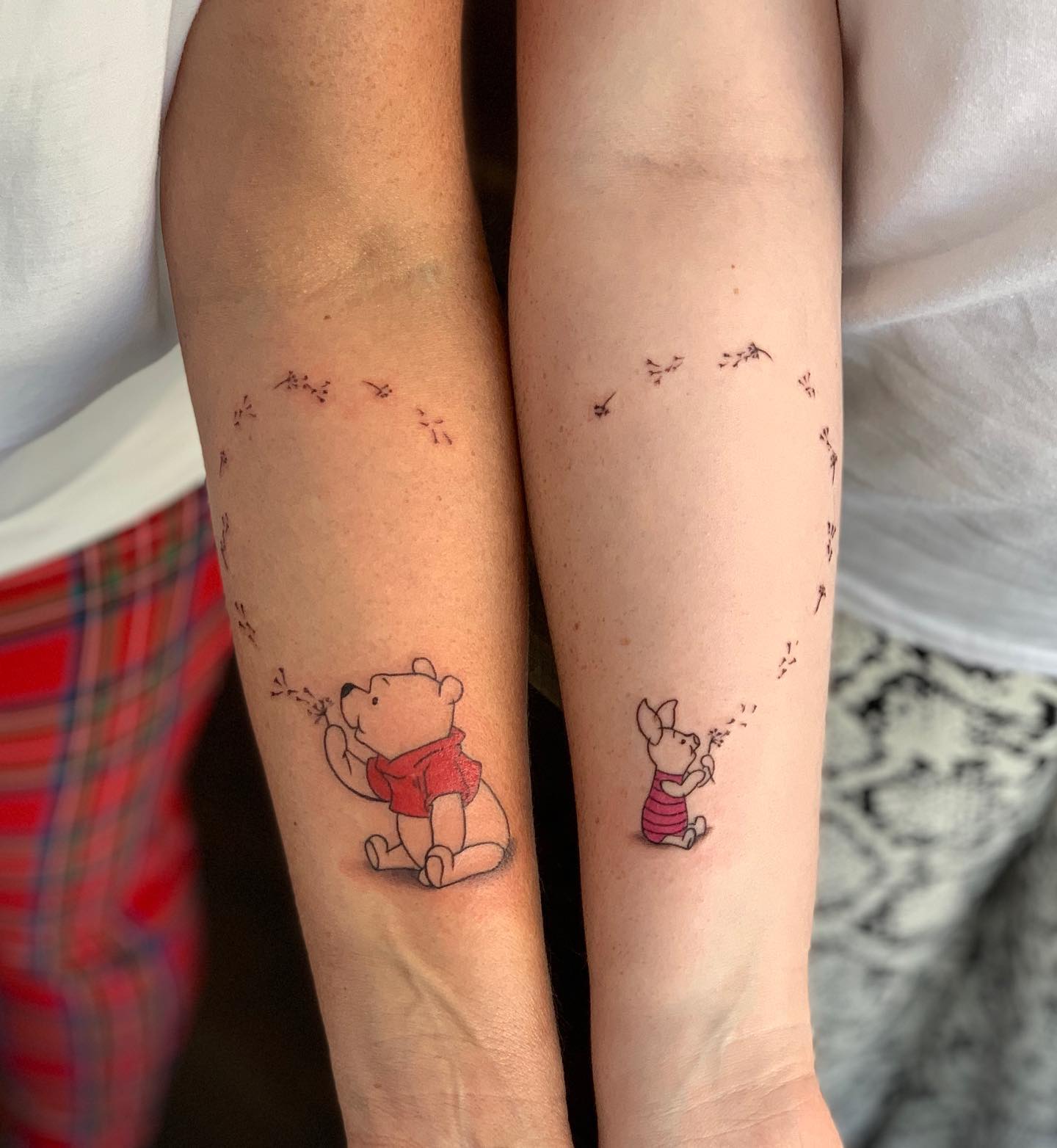Matching Winnie the Pooh and Piglet Tattoos for Mom and Daughter unique mom and daughter tattoos tattoo