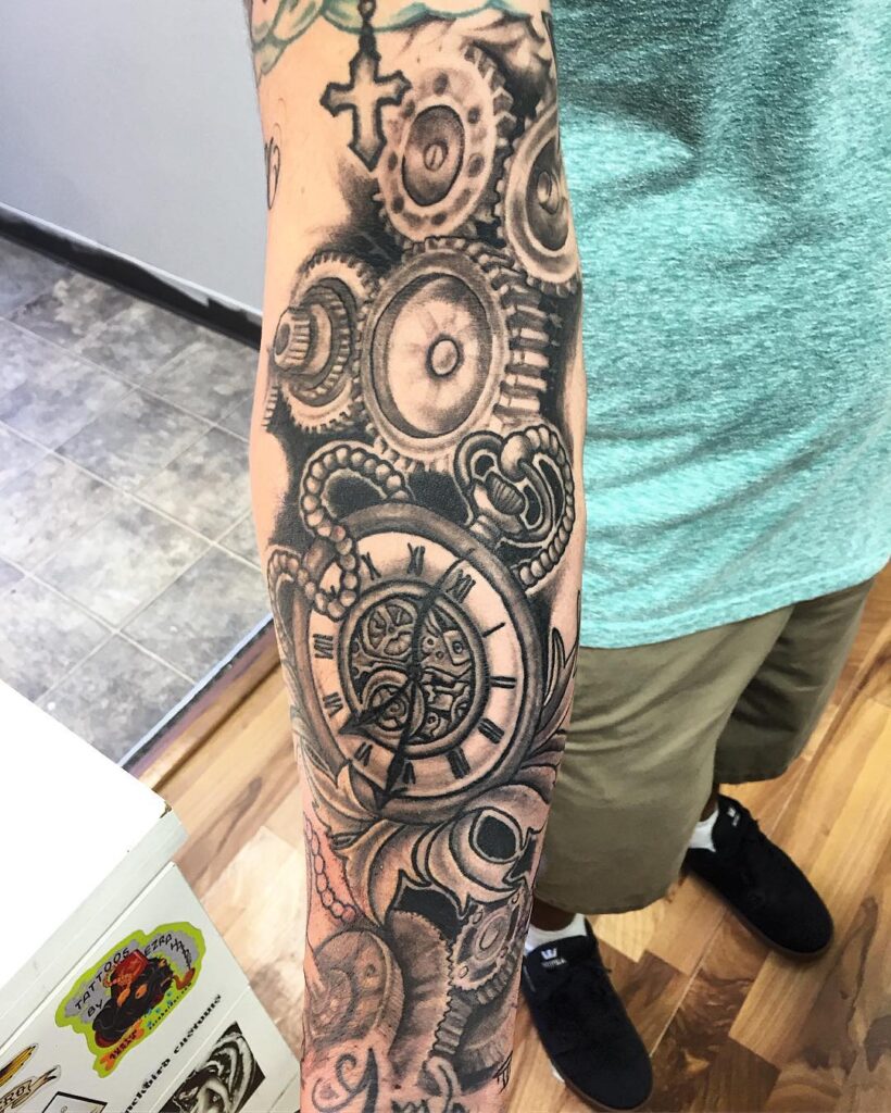 Shattered Pocket Watch Tattoo with Blooming Flowers pocket watch tattoos tattoo