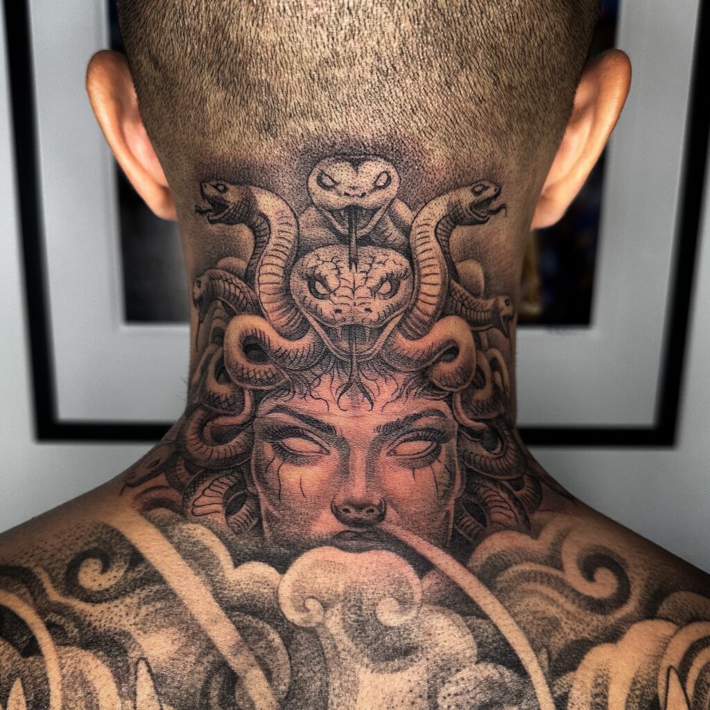 Rose And Cross Neck Tattoo
