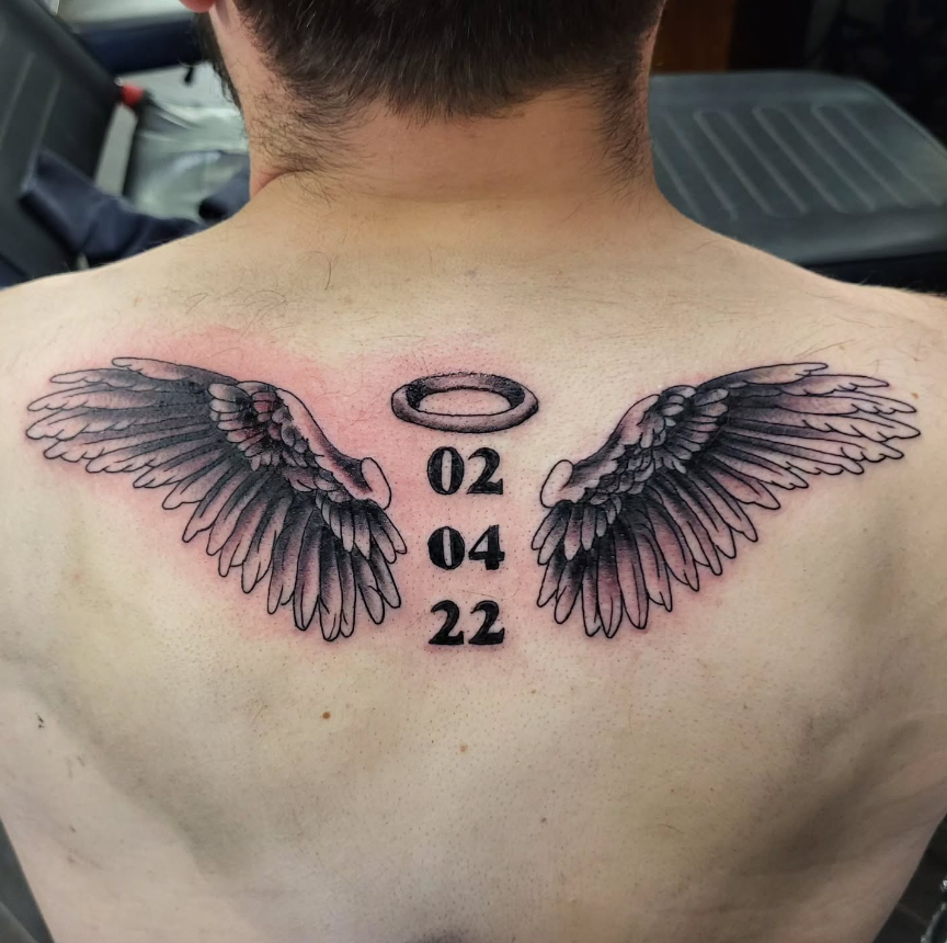 Fear Not Upper Back Wing Tattoo angel wings tattoo ideas on back tattoo
