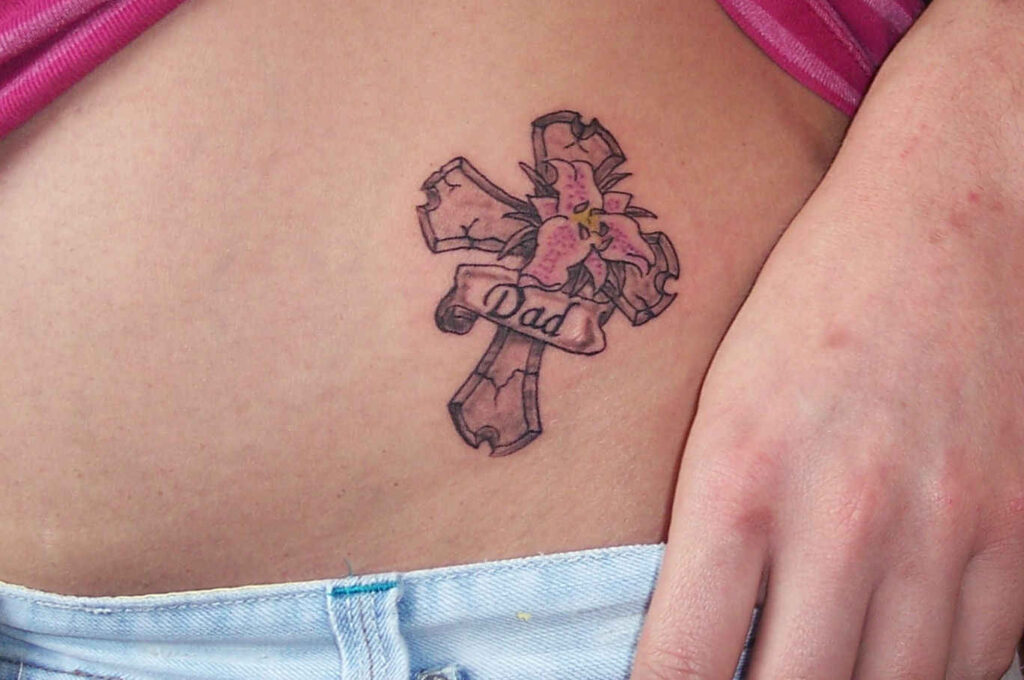 Memorial Cross Tattoo with Lily and “Dad” Banner dad tattoo ideas tattoo