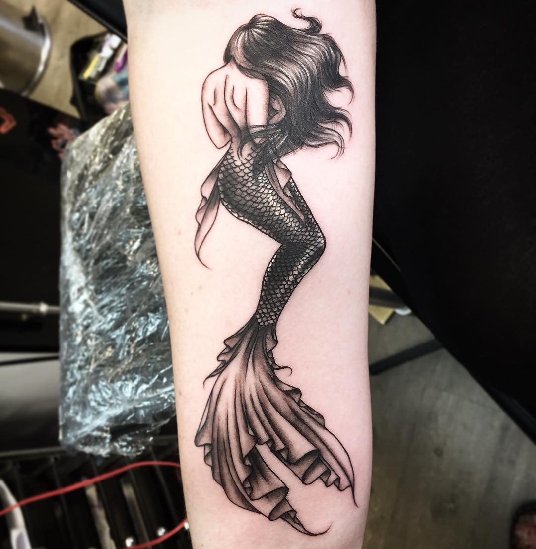 Curled Mermaid Silhouette Tattoo