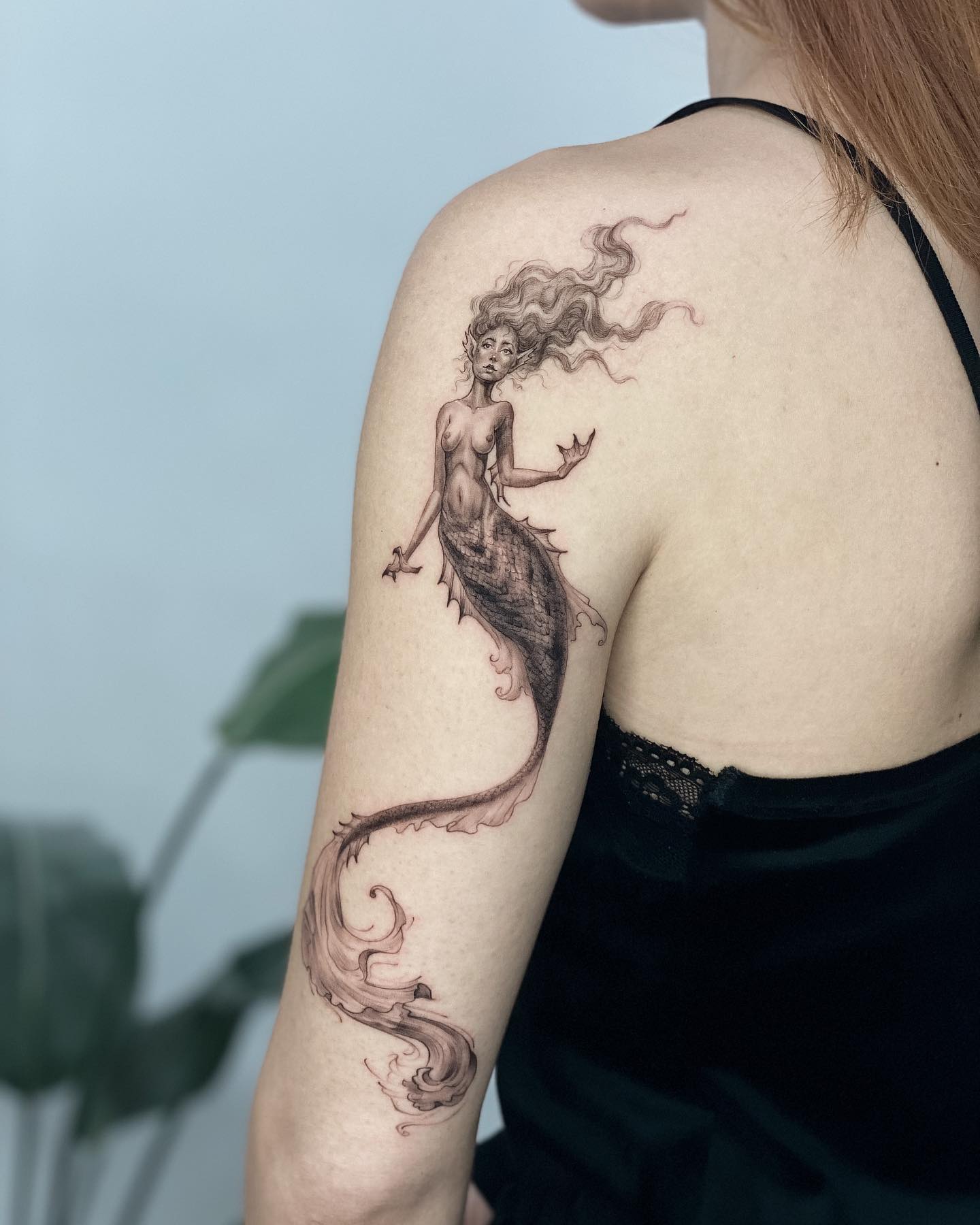 Flowing Tail Mermaid Tattoo
